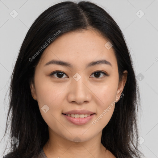 Joyful asian young-adult female with long  brown hair and brown eyes