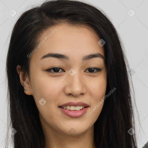 Joyful asian young-adult female with long  brown hair and brown eyes