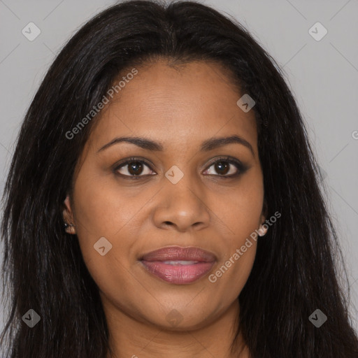 Joyful black young-adult female with long  brown hair and brown eyes