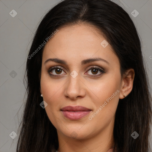 Joyful latino young-adult female with long  brown hair and brown eyes