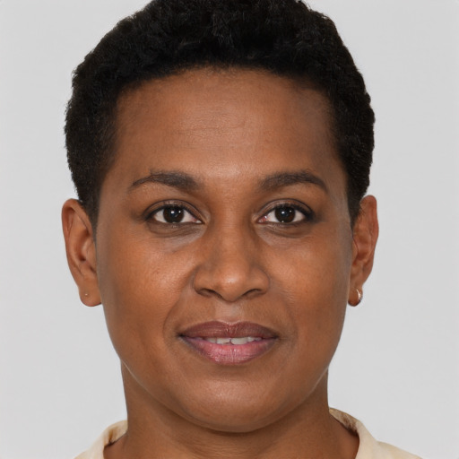 Joyful black young-adult female with short  brown hair and brown eyes