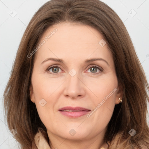 Joyful white adult female with medium  brown hair and grey eyes