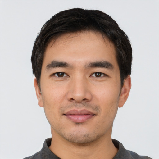 Neutral asian young-adult male with short  black hair and brown eyes