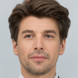 Neutral white young-adult male with short  brown hair and brown eyes