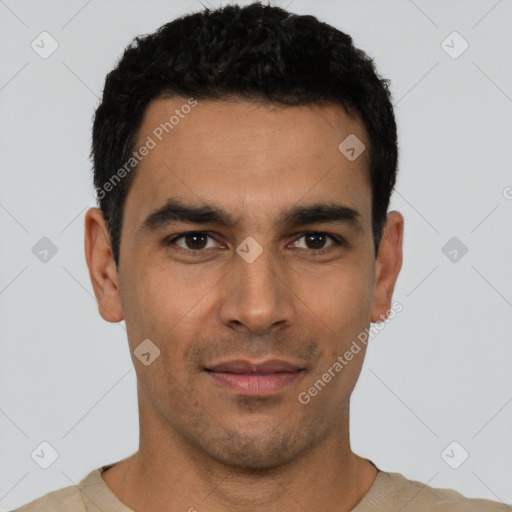 Joyful latino young-adult male with short  black hair and brown eyes