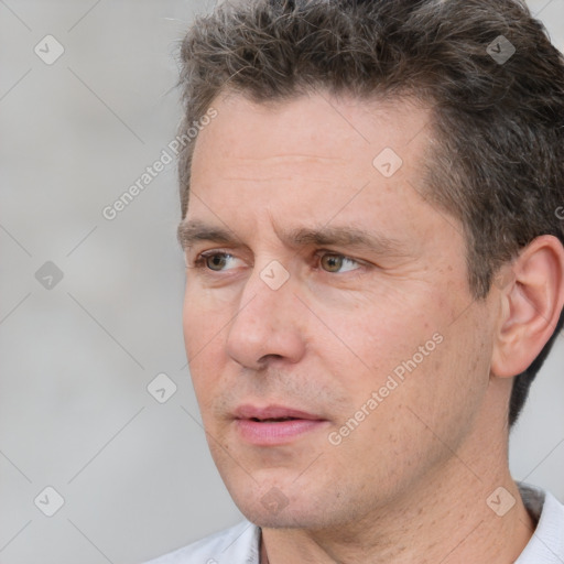 Neutral white adult male with short  brown hair and brown eyes