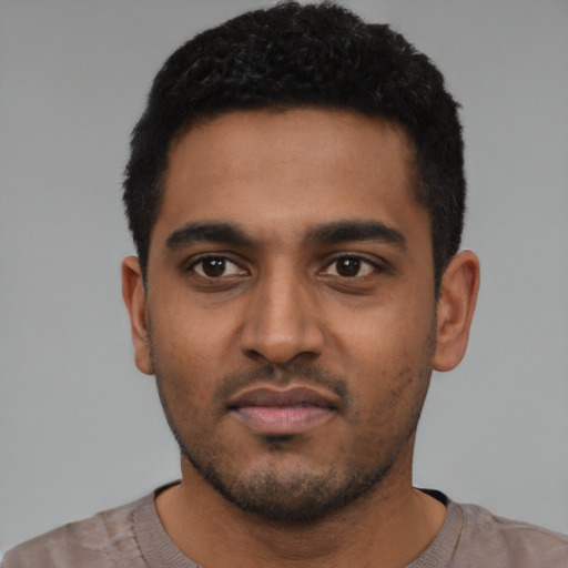 Neutral black young-adult male with short  black hair and brown eyes