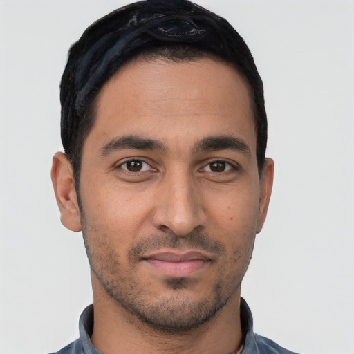 Neutral latino young-adult male with short  black hair and brown eyes