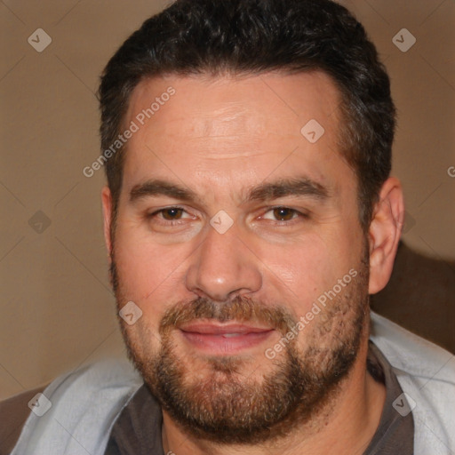 Joyful white adult male with short  brown hair and brown eyes