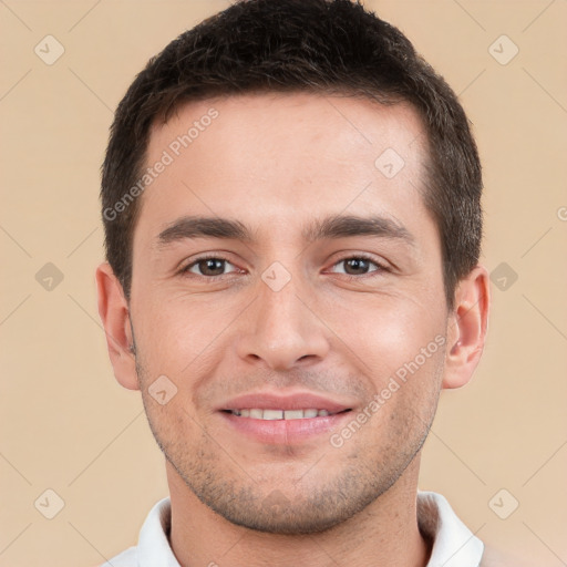 Joyful white young-adult male with short  brown hair and brown eyes