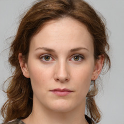 Neutral white young-adult female with medium  brown hair and green eyes