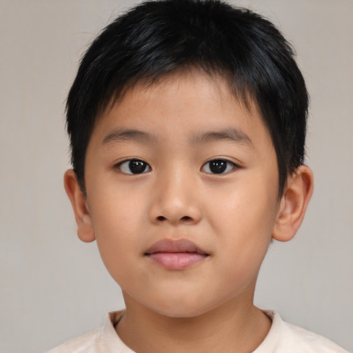 Neutral asian child male with short  brown hair and brown eyes