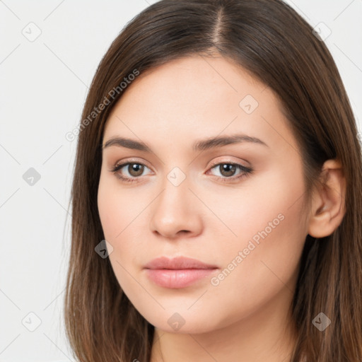 Neutral white young-adult female with long  brown hair and brown eyes