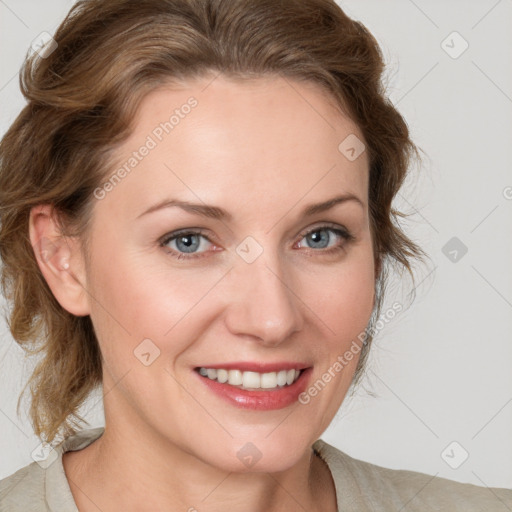 Joyful white young-adult female with medium  brown hair and blue eyes