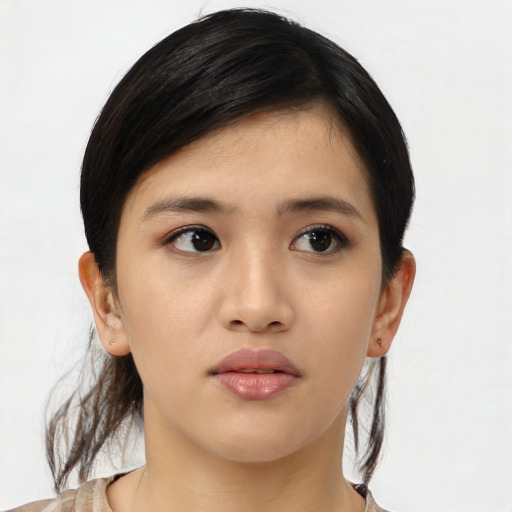 Neutral asian young-adult female with medium  black hair and brown eyes