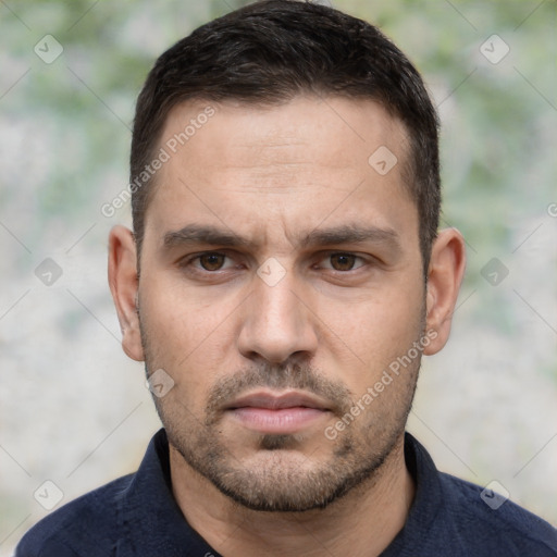 Neutral white young-adult male with short  brown hair and brown eyes