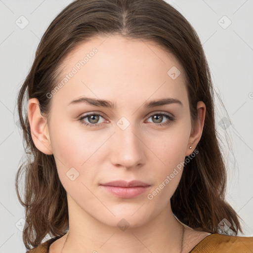 Neutral white young-adult female with long  brown hair and brown eyes