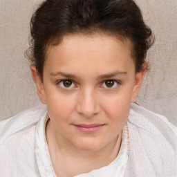 Joyful white child female with short  brown hair and brown eyes