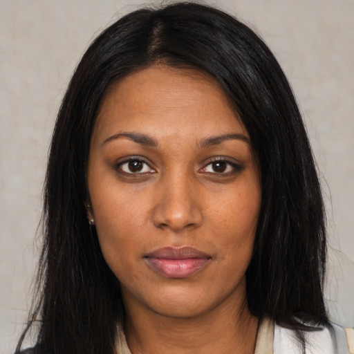 Neutral black young-adult female with long  black hair and brown eyes