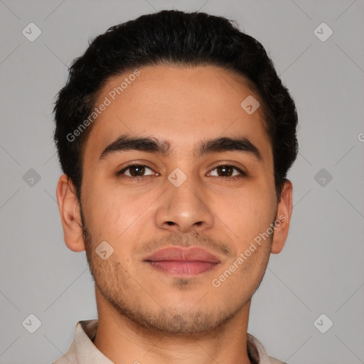 Joyful latino young-adult male with short  brown hair and brown eyes