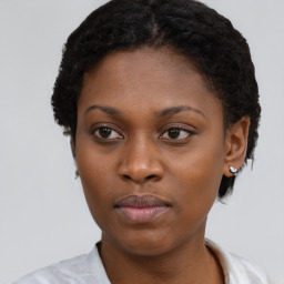 Neutral black young-adult female with short  brown hair and brown eyes