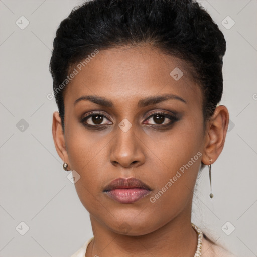 Neutral black young-adult female with short  brown hair and brown eyes