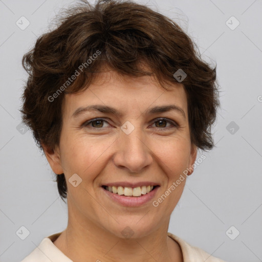 Joyful white adult female with short  brown hair and brown eyes