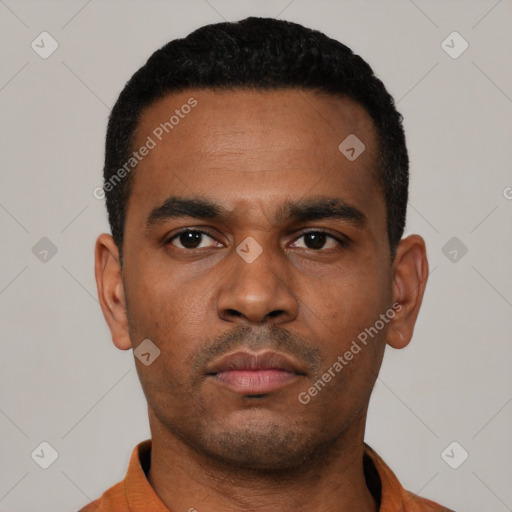 Neutral latino young-adult male with short  black hair and brown eyes