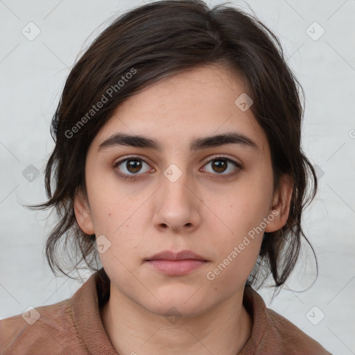 Neutral white young-adult female with medium  brown hair and brown eyes