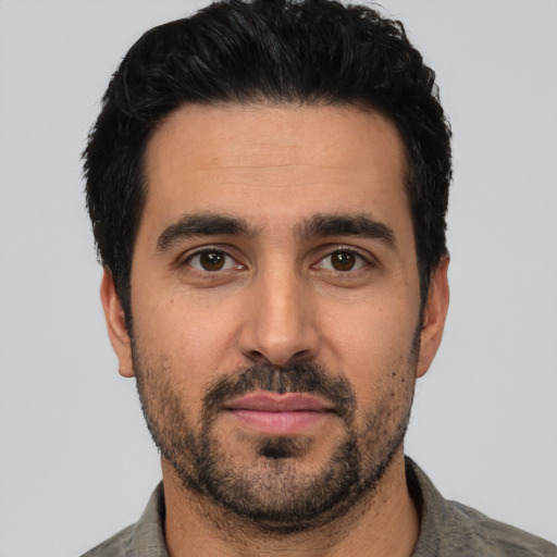 Neutral white young-adult male with short  black hair and brown eyes