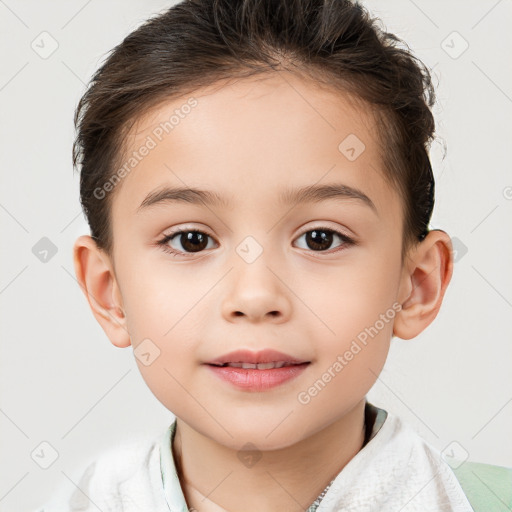 Joyful white child female with short  brown hair and brown eyes