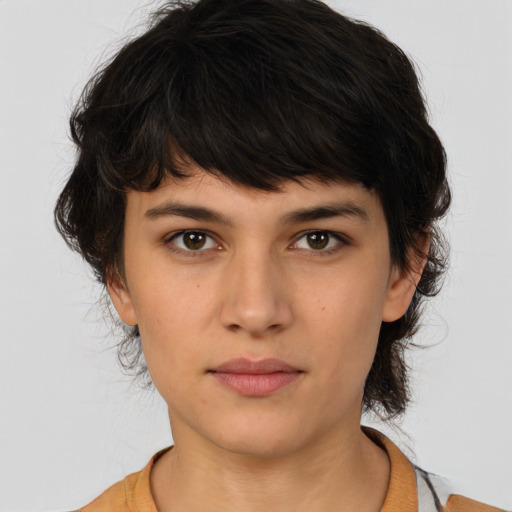 Neutral white young-adult female with medium  brown hair and brown eyes