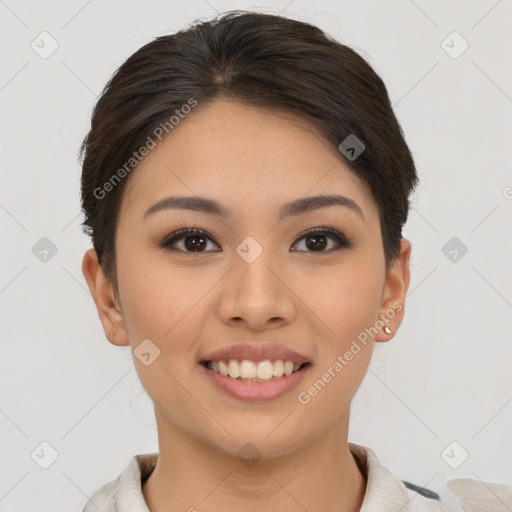 Joyful asian young-adult female with short  brown hair and brown eyes