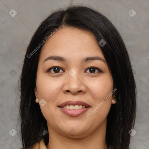 Joyful latino young-adult female with medium  brown hair and brown eyes