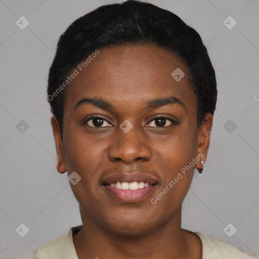 Joyful black young-adult female with short  black hair and brown eyes