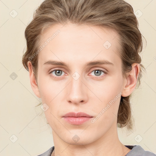 Neutral white young-adult female with medium  brown hair and blue eyes