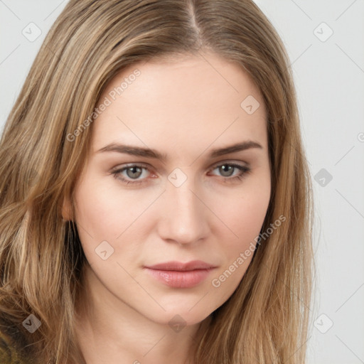 Neutral white young-adult female with long  brown hair and brown eyes