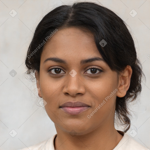 Joyful black young-adult female with medium  black hair and brown eyes