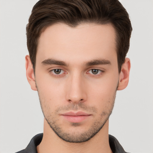 Neutral white young-adult male with short  brown hair and brown eyes