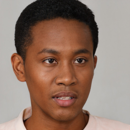 Neutral black young-adult male with short  black hair and brown eyes