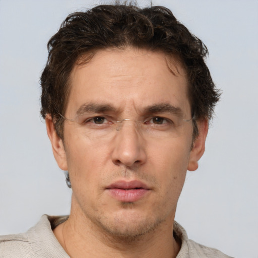 Neutral white adult male with short  brown hair and brown eyes