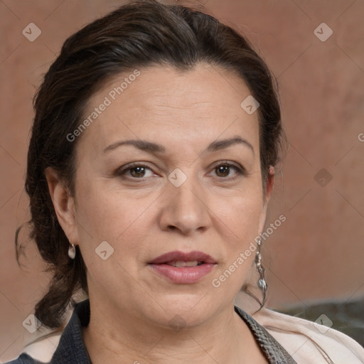 Joyful white adult female with medium  brown hair and brown eyes