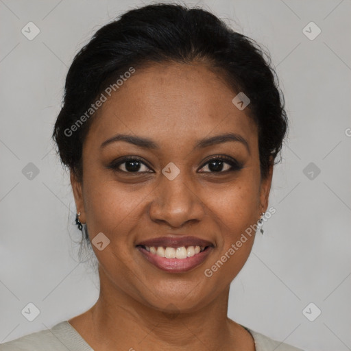 Joyful black young-adult female with short  brown hair and brown eyes