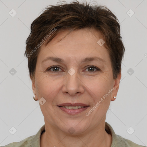 Joyful white adult female with short  brown hair and brown eyes