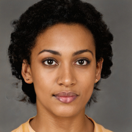 Neutral black young-adult female with short  brown hair and brown eyes