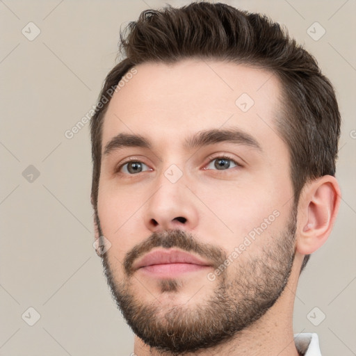 Neutral white young-adult male with short  brown hair and brown eyes