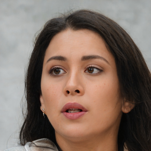 Neutral asian young-adult female with long  brown hair and brown eyes