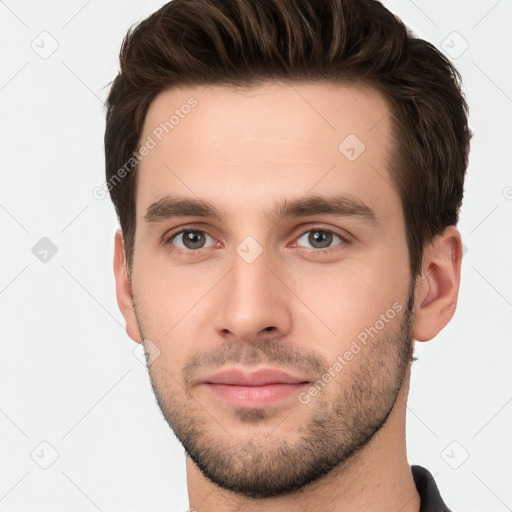 Neutral white young-adult male with short  brown hair and brown eyes