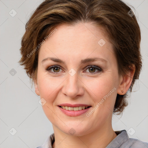 Joyful white young-adult female with medium  brown hair and green eyes