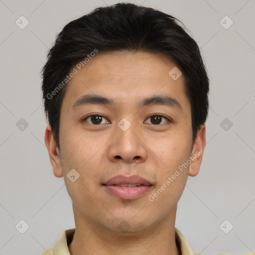 Joyful asian young-adult male with short  brown hair and brown eyes